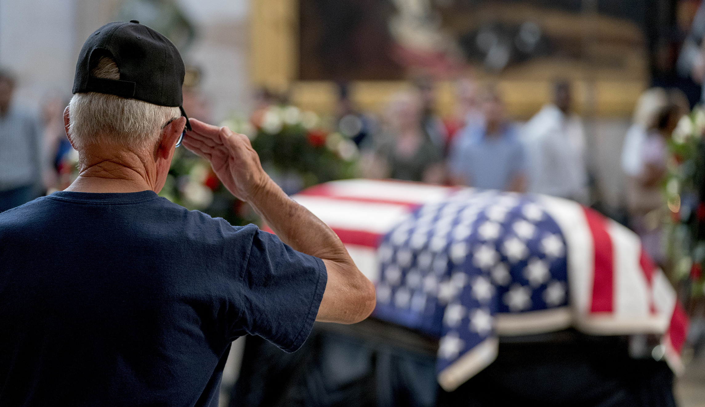 A Vietnam War veteran salutes the casket of Sen. John McCain, R-Ariz., in the Rotunda of the U.S. Capitol, Friday, Aug. 31, 2018, in Washington.