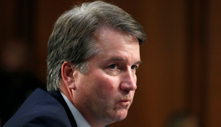 President Trump's Supreme Court nominee, Brett Kavanaugh, turns to listen to a question as he testifies before the Senate Judiciary Committee on Capitol Hill in Washington, D.C.