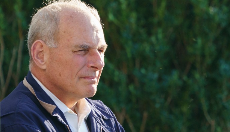 White House chief of staff John Kelly looks out over the South Lawn of the White House in Washington, Wednesday, Sept. 19, 2018, before President Donald Trump boards Marine One for the short trip to Andrews Air Force Base en route to Havelock, N.C.