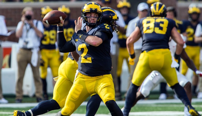 FILE - In this Saturday, Sept. 15, 2018 file photo, Michigan quarterback Shea Patterson (2) throws a pass in the second quarter of an NCAA college football game against SMU in Ann Arbor, Mich. No. 19 Michigan averaged 47 points in lopsided wins the last two weeks in large part because quarterback Shea Patterson has been very accurate and effective. The Wolverines want to take a small step toward ending its 14-year Big Ten title drought by beating winless Nebraska (0-2) on Saturday, Sept. 22, 2018.