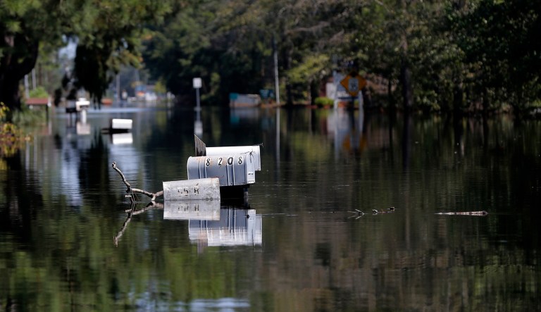 Rows of mailbox protrude through floodwaters in the aftermath of Hurricane Florence in Nichols, S.C., on Sept. 21, 2018.