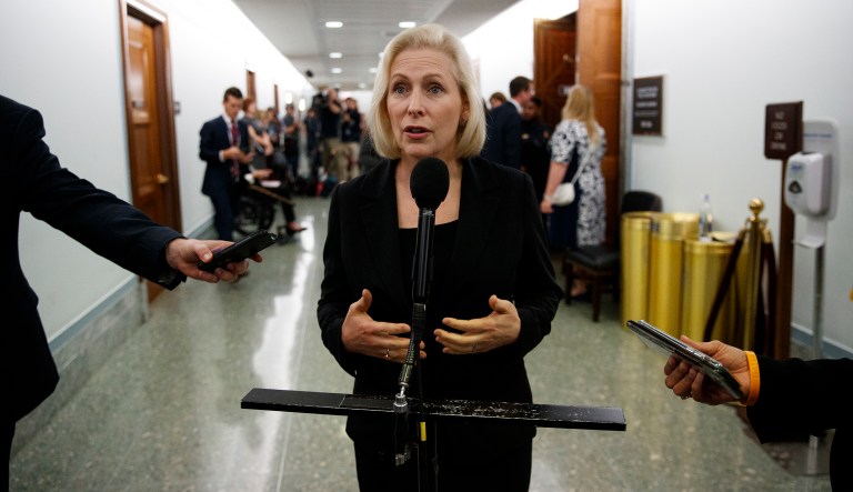 Sen. Kirsten Gillibrand, D-N.Y., speaks to media during a break in a Senate Judiciary Committee hearing on Capitol Hill in Washington, Thursday, Sept. 27, 2018, with Christine Blasey Ford and Supreme Court nominee Brett Kavanaugh.