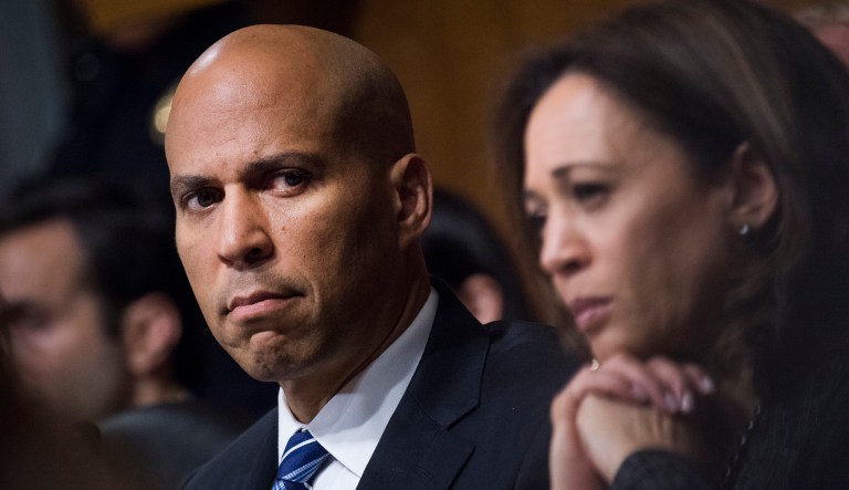 On Sept. 27, 2018, Sen. Cory Booker, D-N.J., and Sen. Kamala Harris, D-Calif., listen as Dr. Christine Blasey Ford testifies during the Senate Judiciary Committee hearing on the nomination of Brett M. Kavanaugh to be an associate justice of the Supreme Court of the United States, focusing on allegations of sexual assault by Kavanaugh against Christine Blasey Ford in the early 1980s.