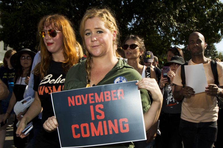 Actress and comedian Amy Schumer joins a march against Supreme Court nominee Brett Kavanaugh before he was confirmed. The vote impact is mixed, according to new surveys from Vox Populi Polling.