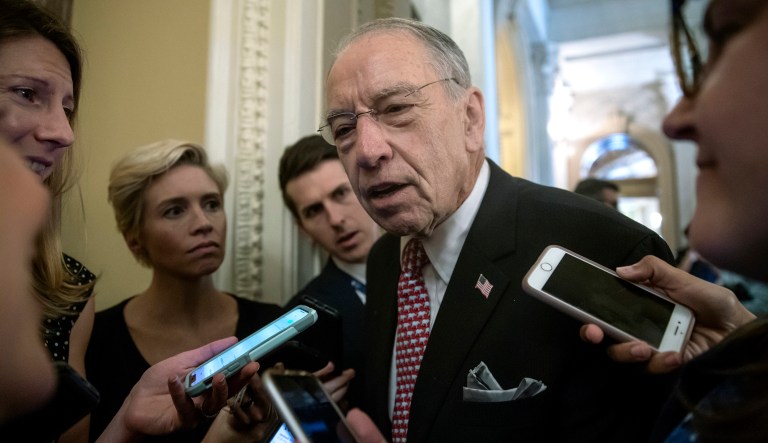 Senate Judiciary Committee Chairman Chuck Grassley, R-Iowa, speaks to reporters as he leaves the chamber following a procedural vote to advance the confirmation of Supreme Court nominee Brett Kavanaugh at the Capitol in Washington, Friday, Oct. 5, 2018.