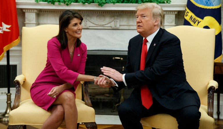 President Donald Trump meets with outgoing U.S. Ambassador to the United Nations Nikki Haley in the Oval Office of the White House, Tuesday, Oct. 9, 2018, in Washington.