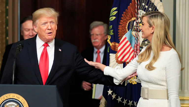 President Trump greets his daughter Ivanka Trump during the Interagency Task Force to Monitor and Combat Trafficking in Persons.