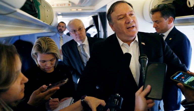 Secretary of State Mike Pompeo speaks to reporters while his plane refuels in Brussels, Belgium Wednesday, Oct. 17, 2018.