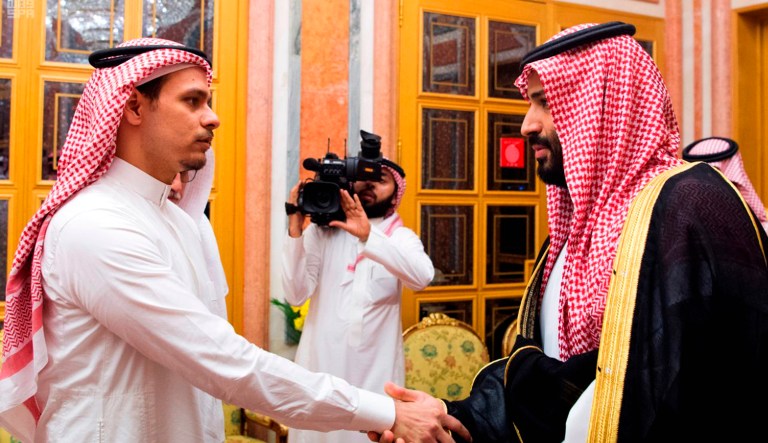 Saudi Crown Prince Mohammed bin Salman (right) shakes hands with Salah Khashoggi, a son of Jamal Khashoggi, in Riyadh, Saudi Arabia, on Tuesday.