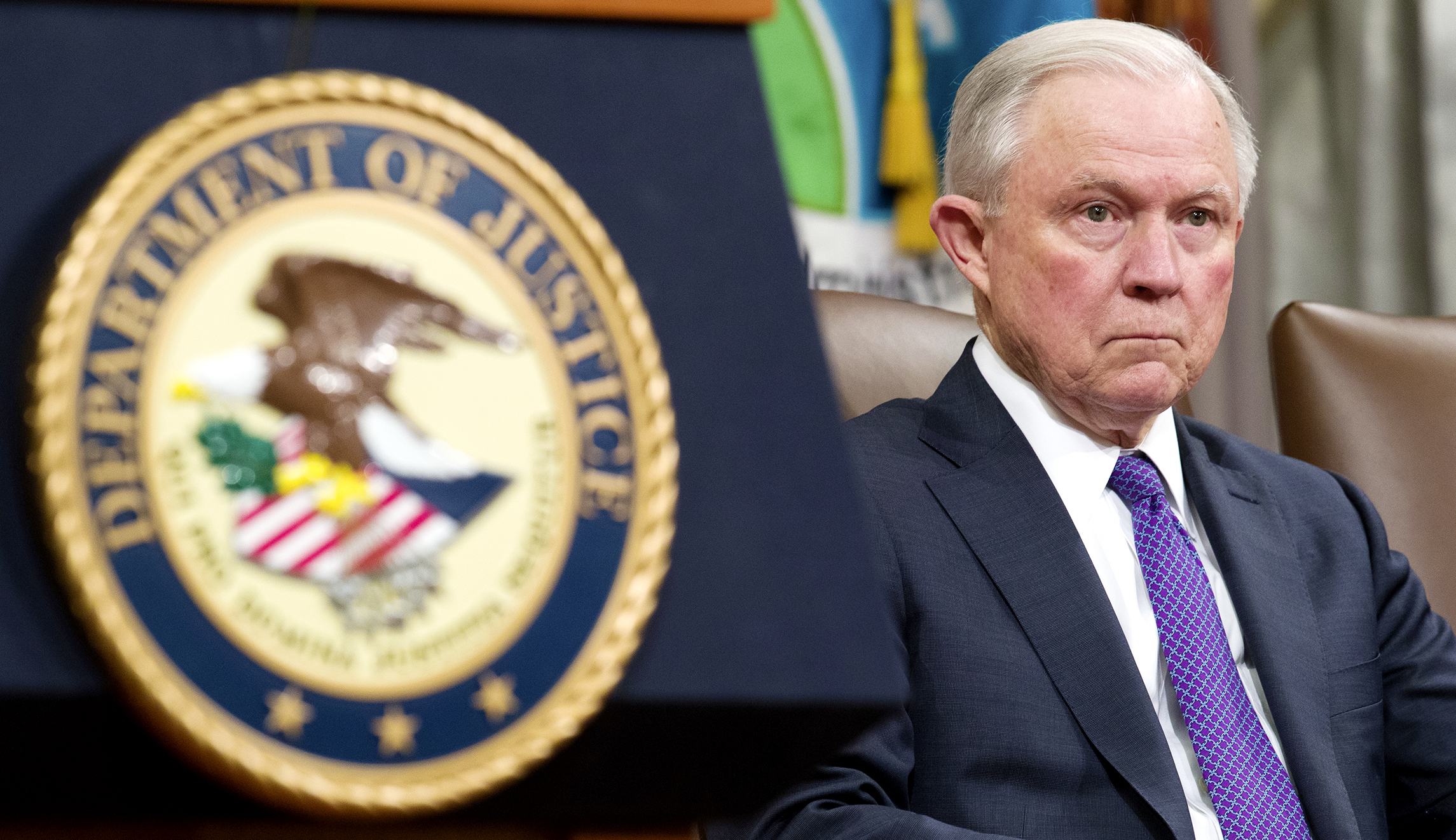 Attorney General Jeff Sessions is seated during an event in D.C.