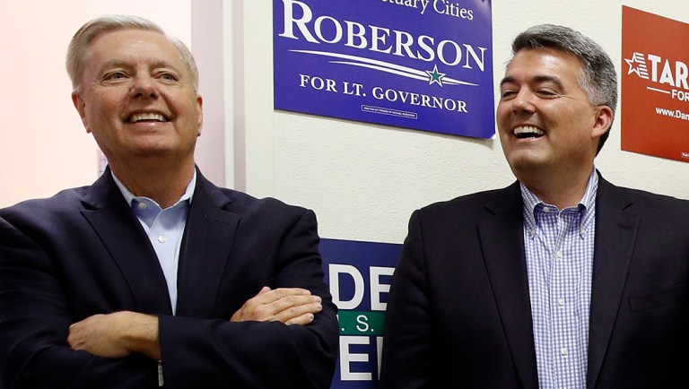 Sen. Lindsey Graham, R-S.C., left, and Sen. Cory Gardner, R-Colo., second from left.