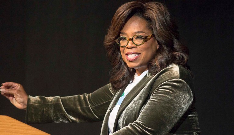 Oprah Winfrey speaks to a crowd during a town hall conversation for gubernatorial candidate Stacey Abrams at the Cobb Civic Center's Jennie T. Anderson Theatre in Marietta, Ga., Thursday, Nov. 1, 2018. Winfrey visited Georgia on Thursday to canvass neighborhoods in Metro Atlanta and show her support for gubernatorial candidate Stacey Abrams.