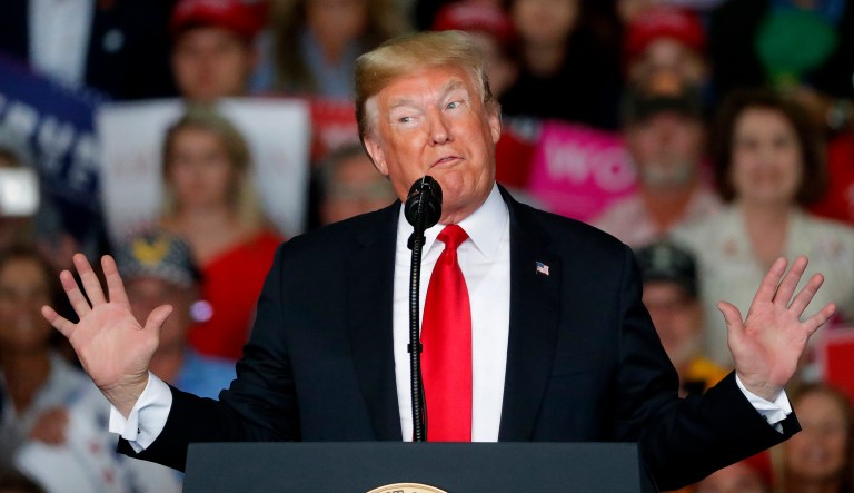 President Trump speaks during a rally for Georgia Republican gubernatorial candidate Brian Kemp, Sunday, Nov. 4, 2018, in Macon, Ga.