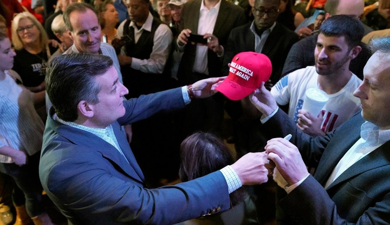 Sen. Ted Cruz, R-Texas, left, greets the crowd during a campaign event in Cypress, Texas.