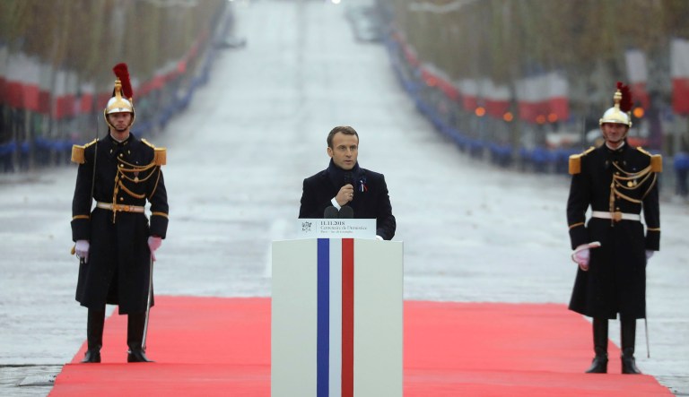French President Emmanuel Macron delivers a speech during a ceremony at the Arc de Triomphe in Paris as part of the commemorations marking the 100th anniversary of the 11 November 1918 armistice, ending World War I, Sunday, Nov. 11, 2018.