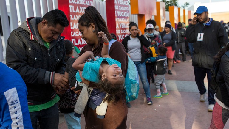 Part of the Central American migrant caravan waiting in line to receive a number as part of the process to apply for asylum in the United States, at the border in Tijuana, Mexico.