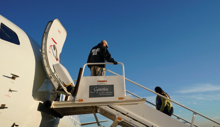 An immigrant who entered the United States illegally is deported on a flight to El Salvador by U.S. Immigration and Customs Enforcement in Houston.