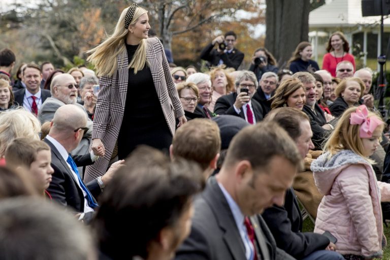 Ivanka Trump, the daughter of President Trump, grabs her youngest child, Theodore James Kushner, as he runs into the audience before President Trump and first lady Melania Trump arrive for a ceremony to pardon the National Thanksgiving Turkey in the Rose Garden of the White House in Washington, Tuesday.