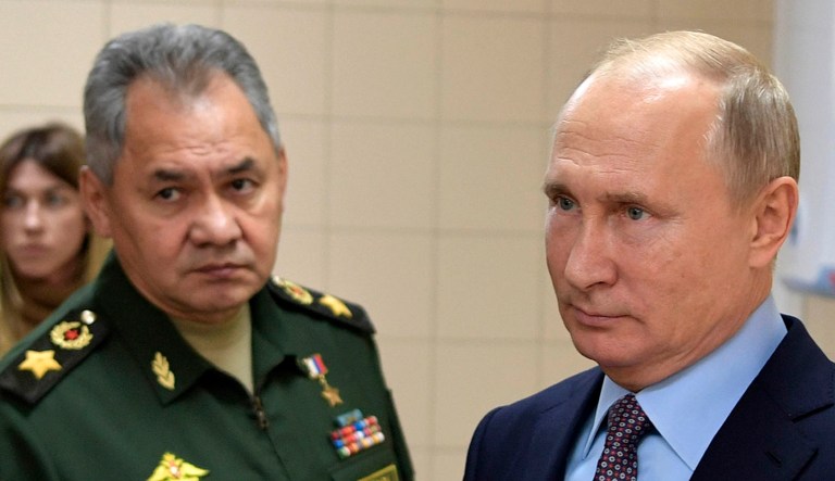 Russian President Vladimir Putin, right, and Defense Minister Sergei Shoigu visit a military technological center in Anapa, Russia, Thursday, Nov. 22, 2018. Putin said the new center would play an important role in developing advanced weapons technologies. 