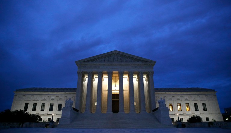 In this Sept. 27, 2018, file photo, the Supreme Court building is seen at dawn on Capitol Hill in Washington. The Trump administration is asking the Supreme Court to fast-track cases on the president's decision to prevent certain transgender people from serving in the military. The administration asked the court on Nov. 23 to take up three cases on the issue. 