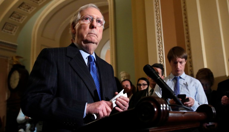 Senate Majority Leader Mitch McConnell, R-Ky., listens to a question as he speaks to the media after a Republican policy luncheon.