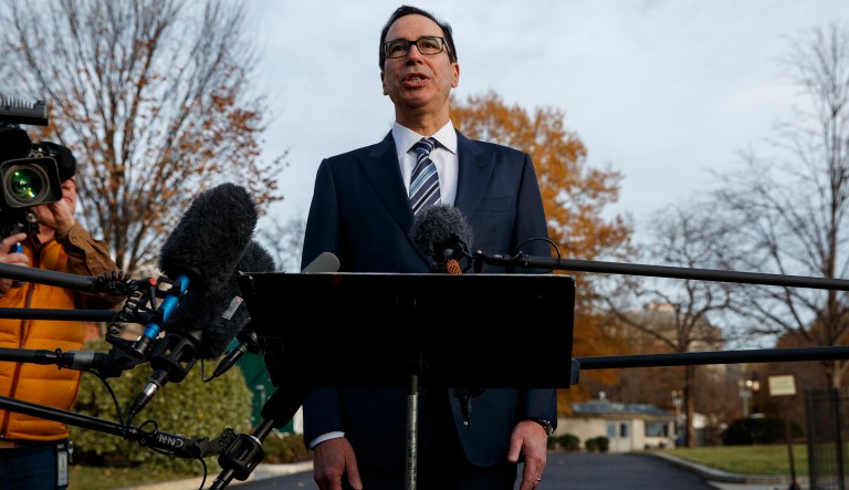 Treasury Secretary Steve Mnuchin talks with reporters about trade negotiations with China, at the White House, Monday, Dec. 3, 2018, in Washington.