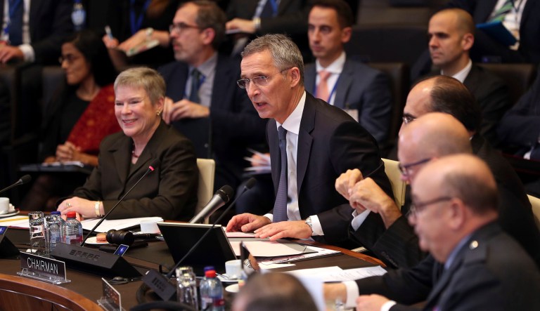 NATO Secretary General Jens Stoltenberg, center, chairs a round table meeting of the North Atlantic Council with Georgia and Ukraine at NATO headquarters in Brussels, Tuesday, Dec. 4, 2018. 