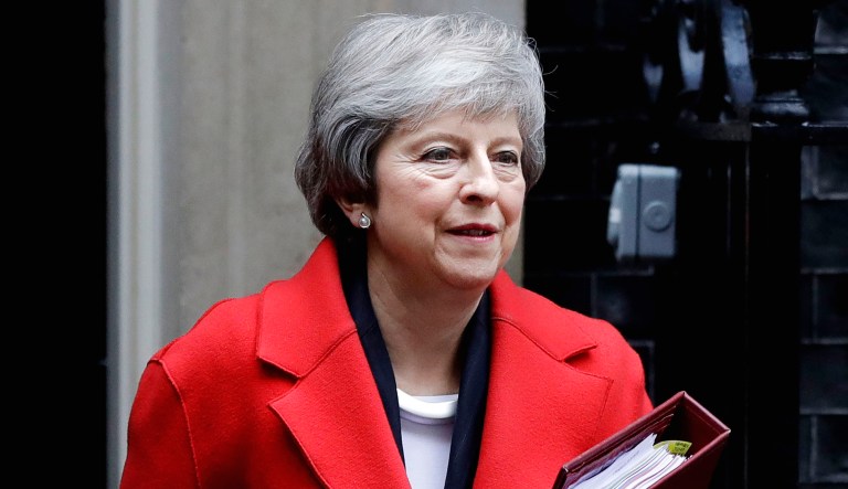 Prime Minister Theresa May of the United Kingdom leaves Downing Street in London.