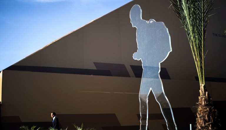 An art installation depicting a migrant is placed at the venue of U.N. Migration Conference in Marrakech, Morocco, Tuesday, Dec. 11, 2018.