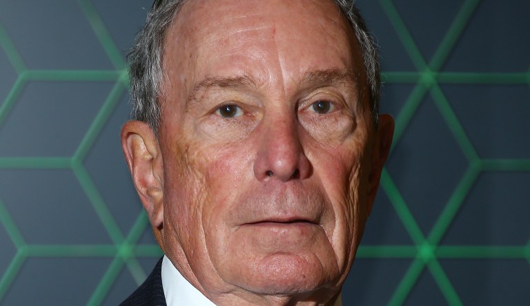 Michael Bloomberg poses for photographers upon arrival at the Bloomberg and Vanity Fair Gala Dinner in central London, Tuesday, Dec. 11, 2018. 