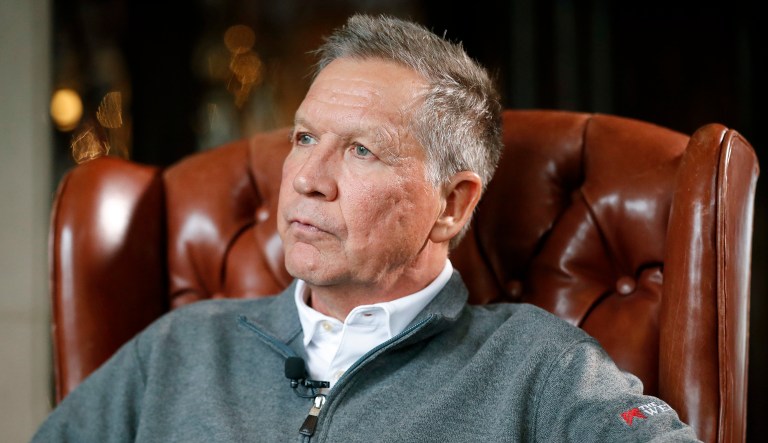Ohio Gov. John Kasich sits for an interview with The Associated Press at the Ohio Governor's Residence and Heritage Garden, Thursday, Dec. 13, 2018, in Columbus.
