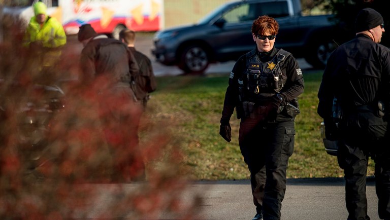 Deputies from the Washtenaw County Sheriff's Office investigate a reported bomb threat at Eat Local.
