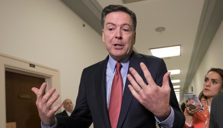 Former FBI Director James Comey speaks to reporters on Capitol Hill Washington, D.C.