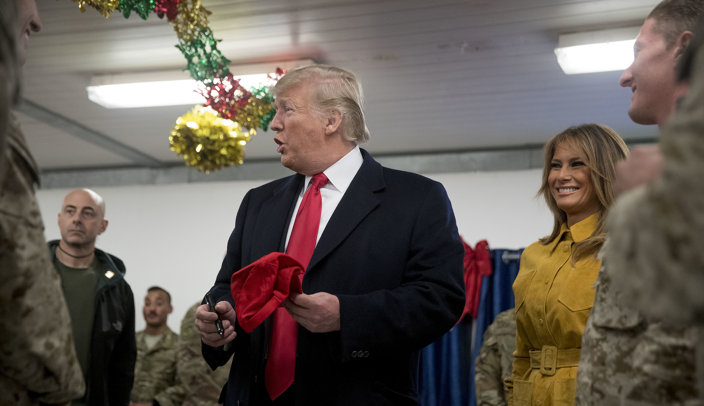 No regulation violated: Air Force backs Trump over signing MAGA hats for troops