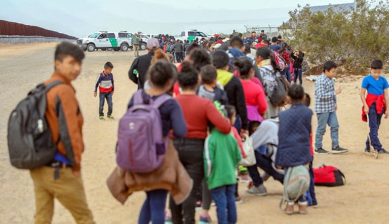 This Monday, Jan. 14, 2019 photo released by U.S. Customs and Border Protection shows some of 376 Central Americans the Border Patrol says it arrested in southwest Arizona.