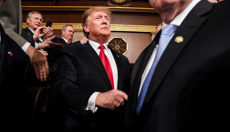 President Donald Trump arrives in the House chamber before giving his State of the Union address to a joint session of Congress, Tuesday, Feb. 5, 2019 at the Capitol in Washington. 