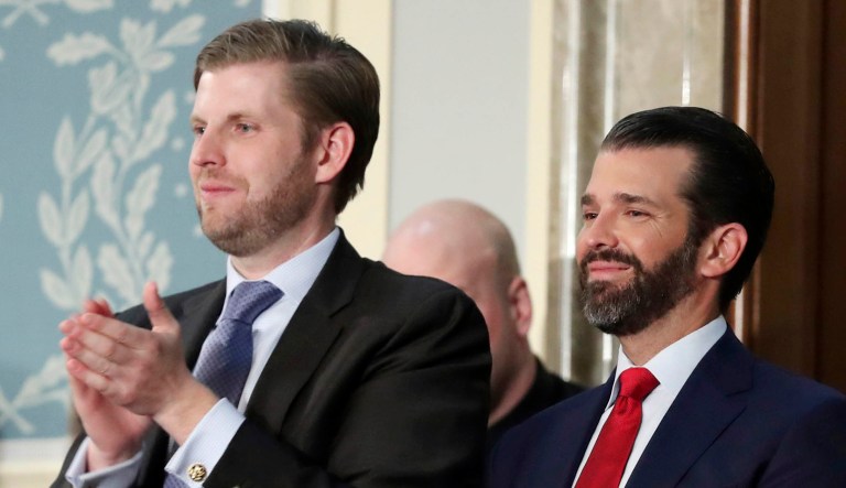 Eric Trump and Donald Trump Jr. are shown.