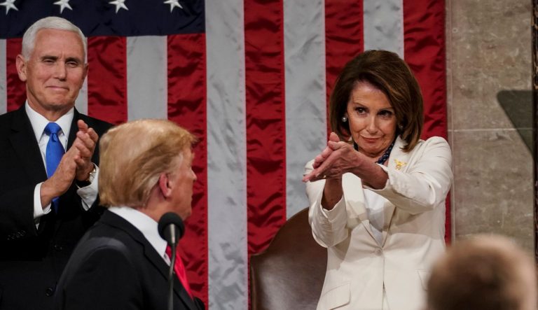 President Donald Trump turns to House speaker Nancy Pelosi of Calif., as he delivers his State of the Union address to a joint session of Congress on Capitol Hill in Washington, as Vice President Mike Pence watches, Tuesday, Feb. 5, 2019.