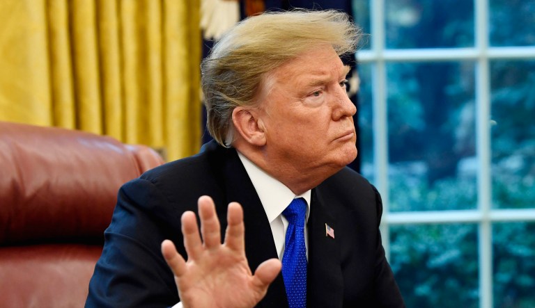President Trump gestures.