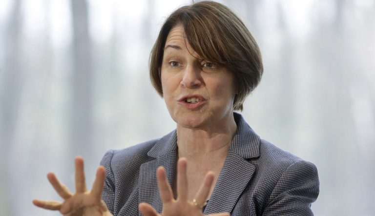 U.S. Sen. Amy Klobuchar, D-Minn., speaks to voters, Sunday, Feb. 24, 2019, during a campaign stop at a home, in Nashua, N.H. 