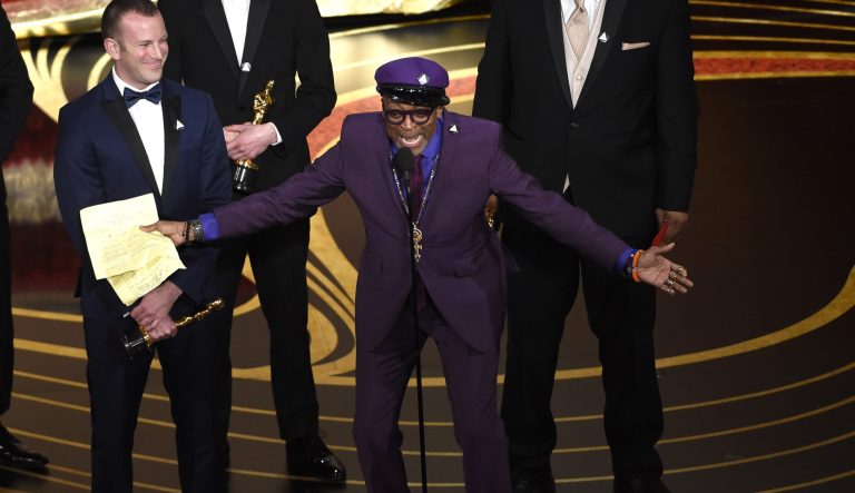 Charlie Wachtel, left, and Spike Lee accept the award for best adapted screenplay for "BlacKkKlansman" at the Oscars on Sunday, Feb. 24, 2019, at the Dolby Theatre in Los Angeles. 