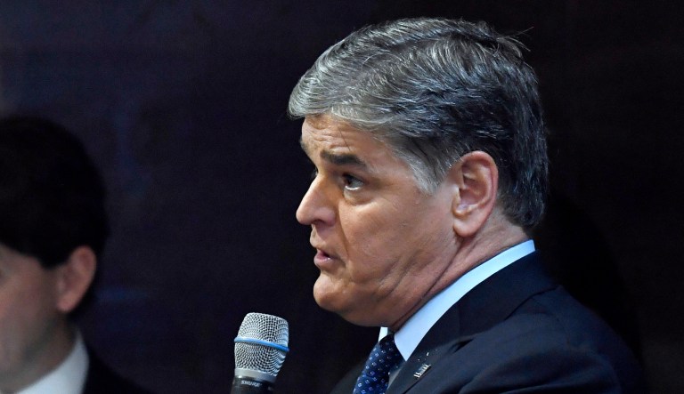 Sean Hannity asks a question of President Trump during a press conference in Hanoi, Vietnam.