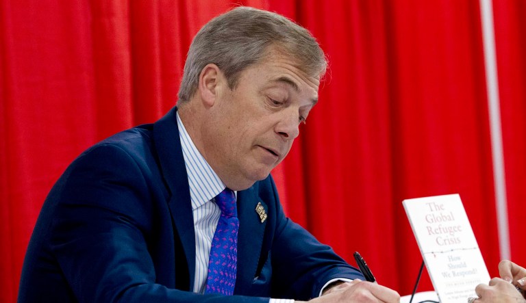 British politician and member of the European Parliament Nigel Farage sign copies of his book at Conservative Political Action Conference, CPAC 2019, in Oxon Hill, Md., Friday, March 1, 2019. 