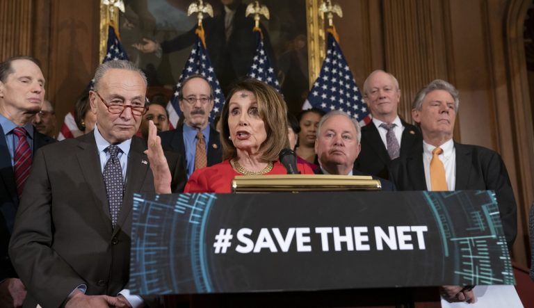 Speaker of the House Nancy Pelosi, D-Calif., joined by Senate Minority Leader Chuck Schumer, D-N.Y., left, announces the "Save The Internet Act," congressional Democrats' plan to reinstate "net neutrality" rules that President Donald Trump repealed in 2017, during an event at the Capitol in Washington, Wednesday, March 6, 2019. 