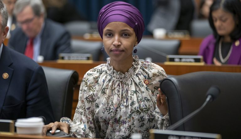 Rep. Ilhan Omar, D-Minn., sits with fellow Democrats on the House Education and Labor Committee during a bill markup, on Capitol Hill in Washington, Wednesday, March 6, 2019. 