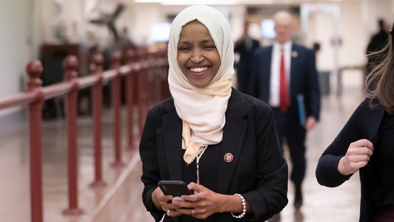 Rep. Ilhan Omar, D-Minn., walks to the chamber.