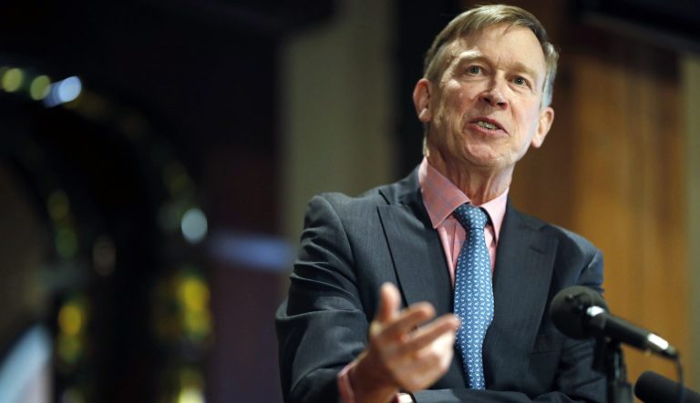 In this March 6, 2019 photo, former Colorado Gov. John Hickenlooper speaks in lower downtown Denver. 