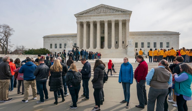 People line up to enter the Supreme Court in Washington, D.C.