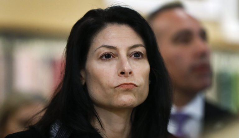 Michigan Attorney General Dana Nessel attends an event for Democratic presidential candidate Sen. Kirsten Gillibrand, D-N.Y., in Clawson, Mich., Monday, March 18, 2019. The Michigan attorney general's office has settled a lawsuit by same-sex couples who say their rights have been violated by faith-based adoption agencies that don't want to work with gays and lesbians. Under the settlement announced Friday, March 22, 2019 the state says it will enforce non-discrimination provisions in its foster care and adoption agency contracts. Nessel initiated settlement talks. She says discrimination in foster care and adoption services is "illegal." 