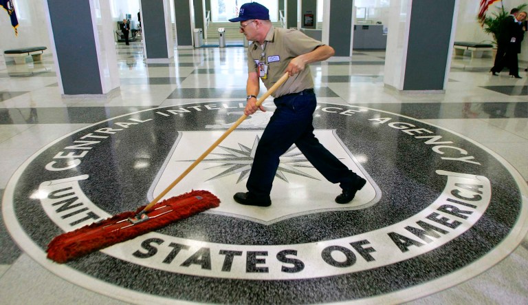 In this March 3, 2005, file photo, a workman dusts the floor at the Central Intelligence Agency headquarters in Langley, Va.
